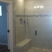 handicap accessible shower with bench from bathroom remodel in Colorado Springs. A handicap accessible shower with bench from bathroom remodel in Colorado Springs.